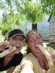 Nouelle and I eating Sugarcane